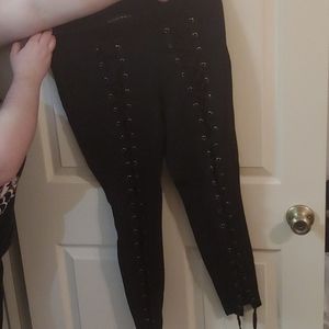 Black leggings lace up front of leg